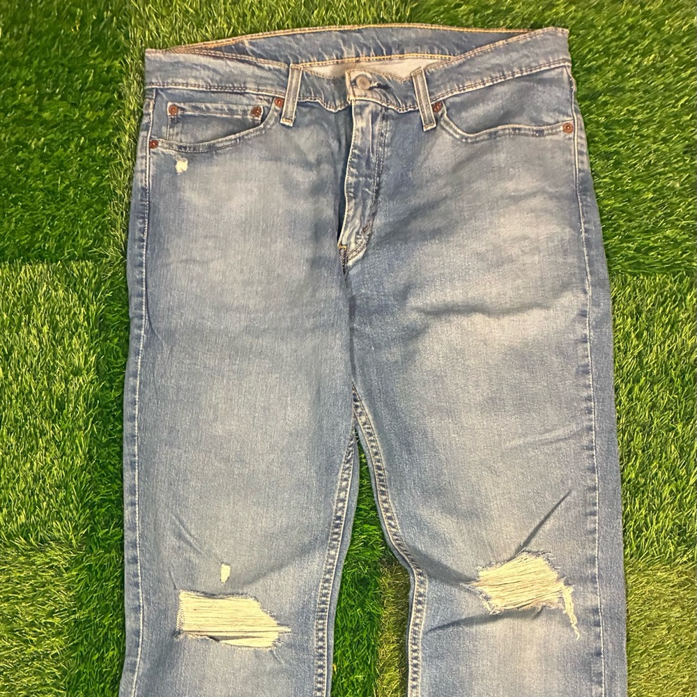 Levi's 511 Slim Straight blue jeans with some distressed features